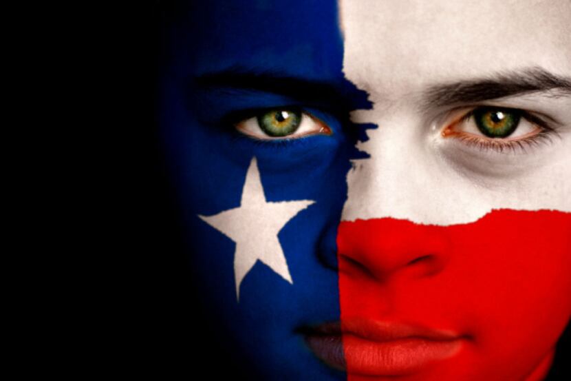 Portrait of a boy with the flag of Texas