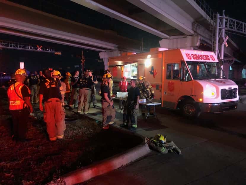Salvation Army crews provided water, Gatorade and snacks to first responders and Dallas...
