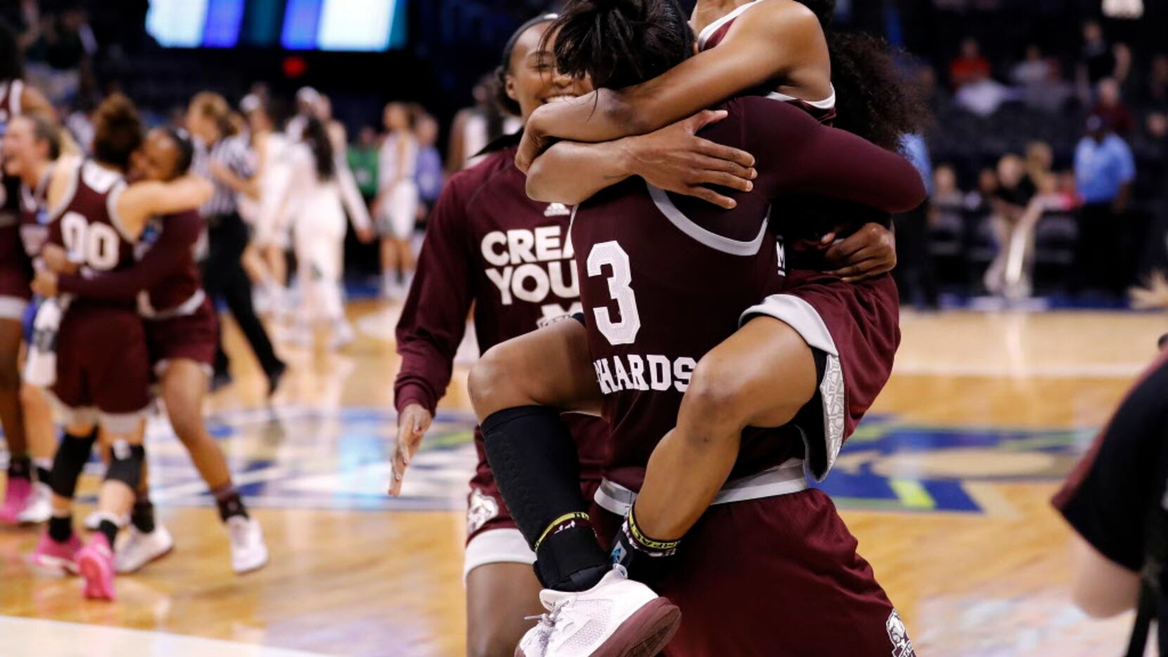 Mississippi State's Morgan William, right, celebrates with Breanna Richardson (3) after a...