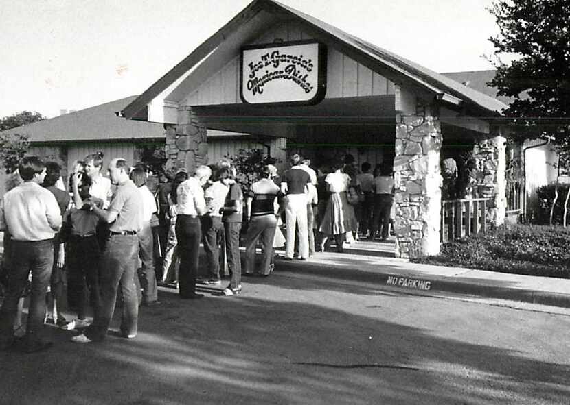 Joe T. Garcia's has been drawing fans in Fort Worth since 1935. Here, fans wait in line in...