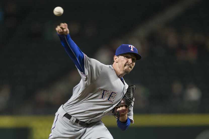 SEATTLE, WA - SEPTEMBER 7: Tanner Scheppers #53 of the Texas Rangers delivers a pitch during...