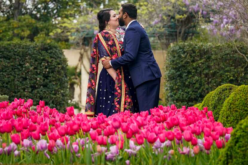 Laura Remson and Abhishek Ravi kissed while posing for wedding photos after getting married...