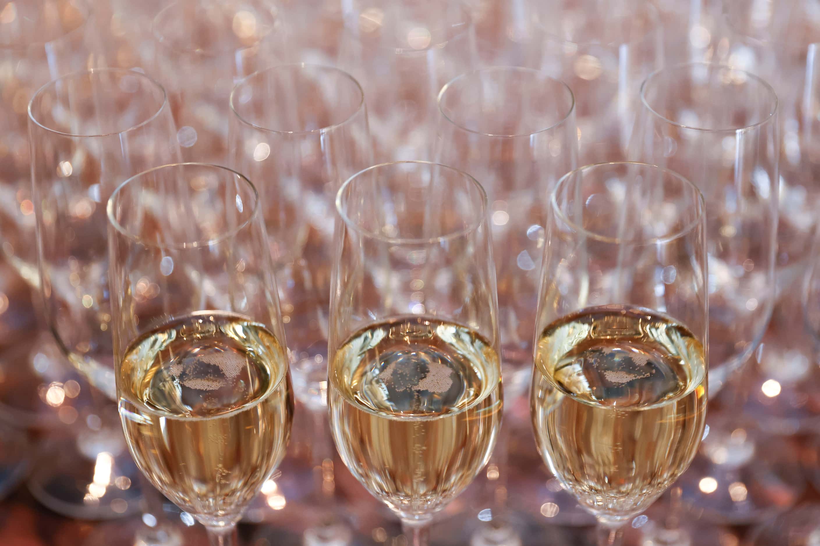 Complimentary sparkling wine is offered at the front entrance of Joey at NorthPark Center in...