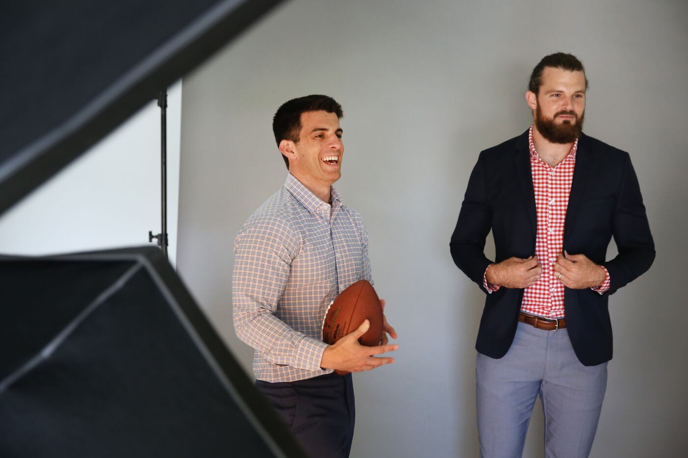 Kevin Lavelle (left), founder and CEO of Mizzen+Main, works with New Orleans Saints punter...