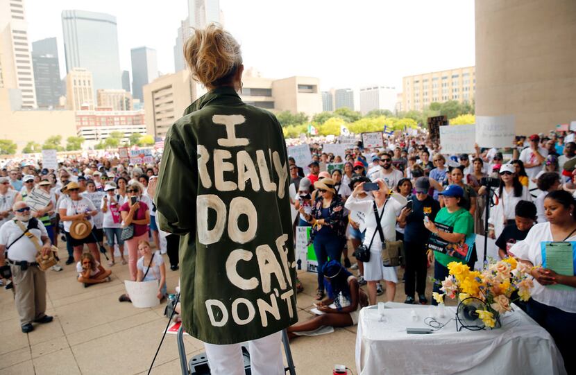 Actress and activist Cheryl Allison wore a "I Really DO Care, Don't U" green jacket as she...