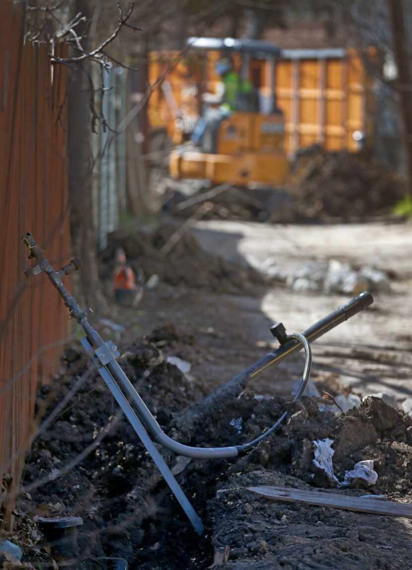 Old steel gas lines were replaced in an alley between Espanola and Fontana drives in Dallas...