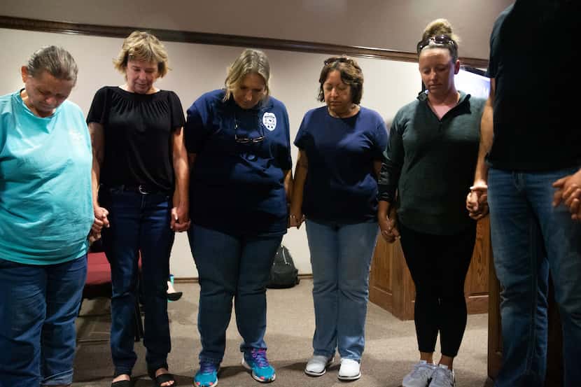 Community members met for prayer before the City Council meeting in Ferris on Oct. 7, 2019....