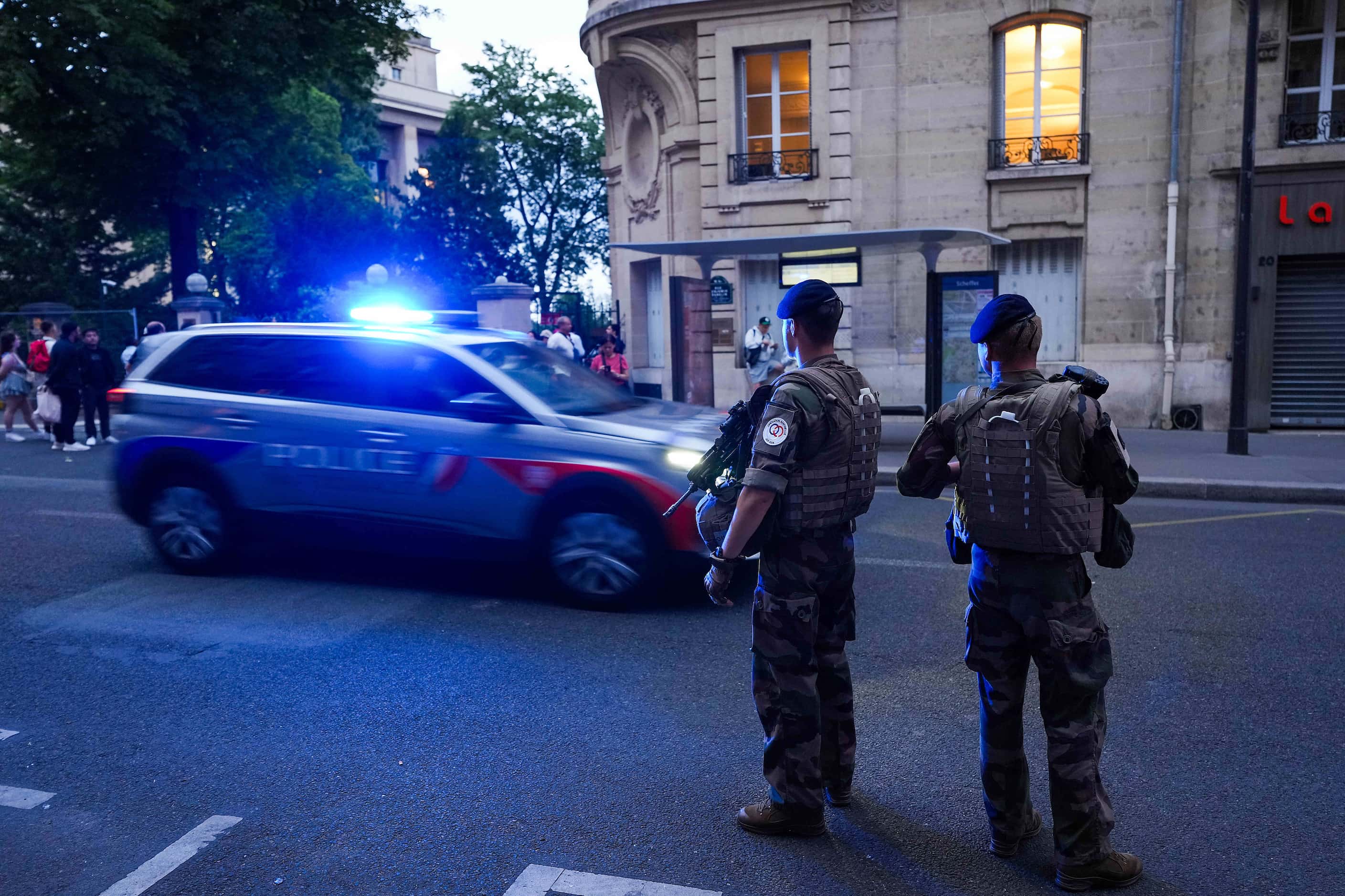Security forces patrol near the Trocadero ahead of the 2024 Summer Olympics on Monday, July...