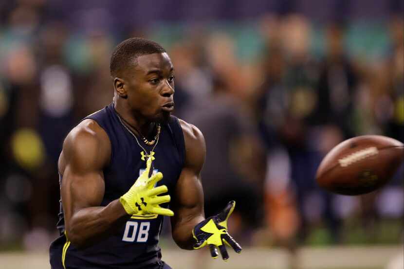 Colorado defensive back Chidobe Awuzie runs a drill at the NFL football scouting combine...