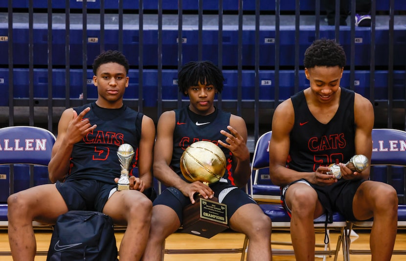 Lake Highlands players pose with their trophy and individual player awards after beating...