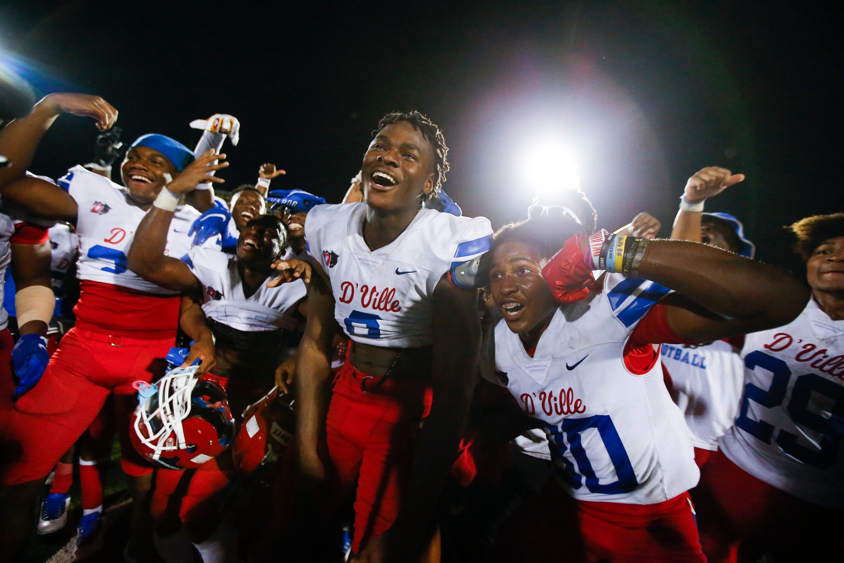 Duncanville celebrates a 42-21 win over DeSoto after a high school football game at DeSoto...