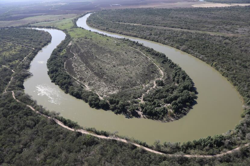 MCALLEN, TX - JANUARY 03:  The Rio Grande snakes along the U.S.-Mexico border on Jan. 3,...