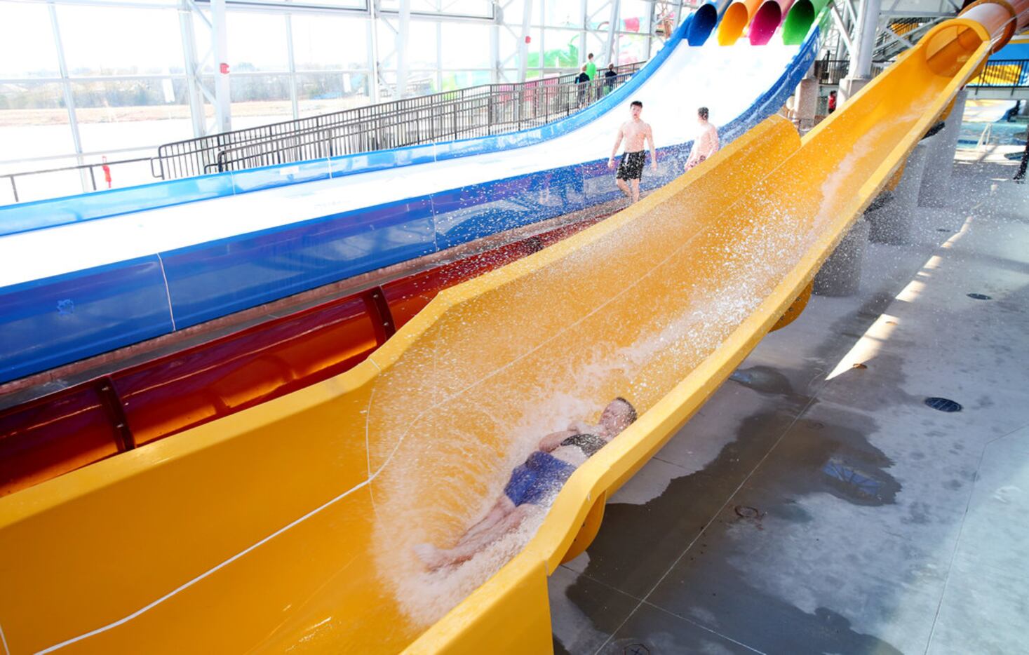 John Akin goes down a water slide during a media day at the new Epic Waters Indoor Waterpark...