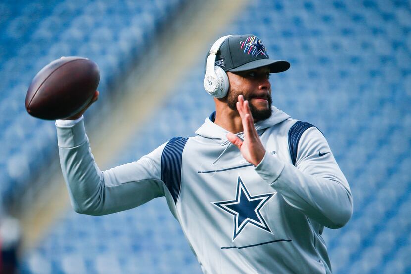 Dallas Cowboys quarterback Dak Prescott (4) warms up during the pregame workouts of an NFL...