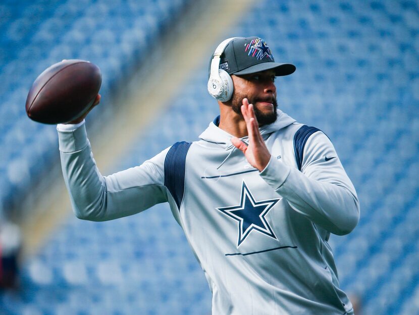 Dallas Cowboys quarterback Dak Prescott (4) warms up during the pregame workouts of an NFL...