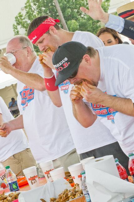 122 wings consumed by "Notorious B.O.B" Bob Shoudt (right) during the Hooters Wing Eating...