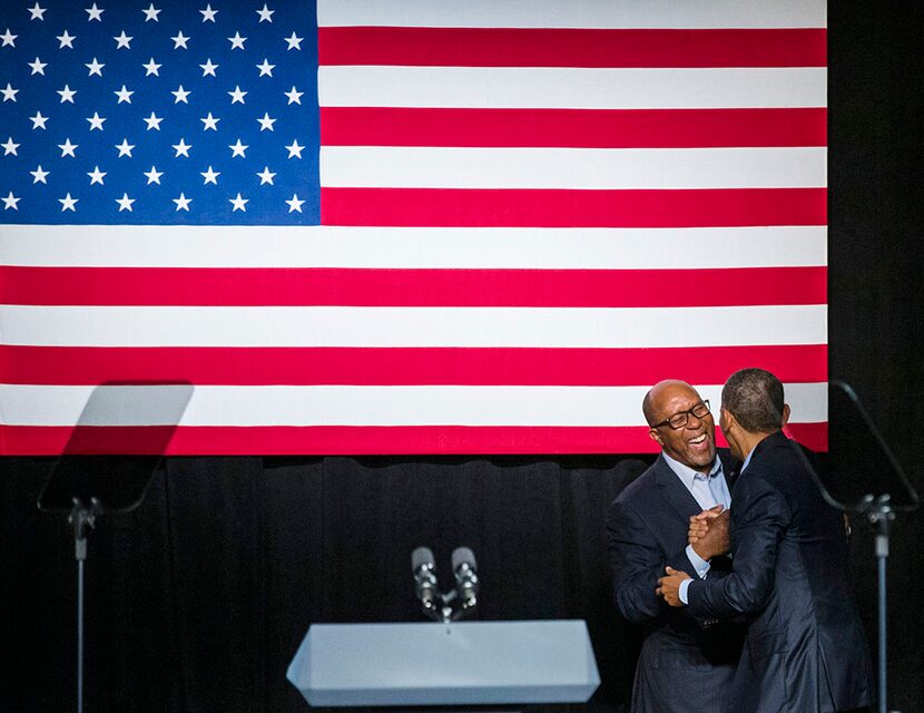  Former Dallas mayor Ron Kirk shakes hands with President Barack Obama at a Democratic...