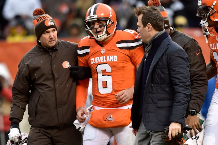 Cleveland Browns quarterback Cody Kessler (6) leaves the field after being injured on a play...