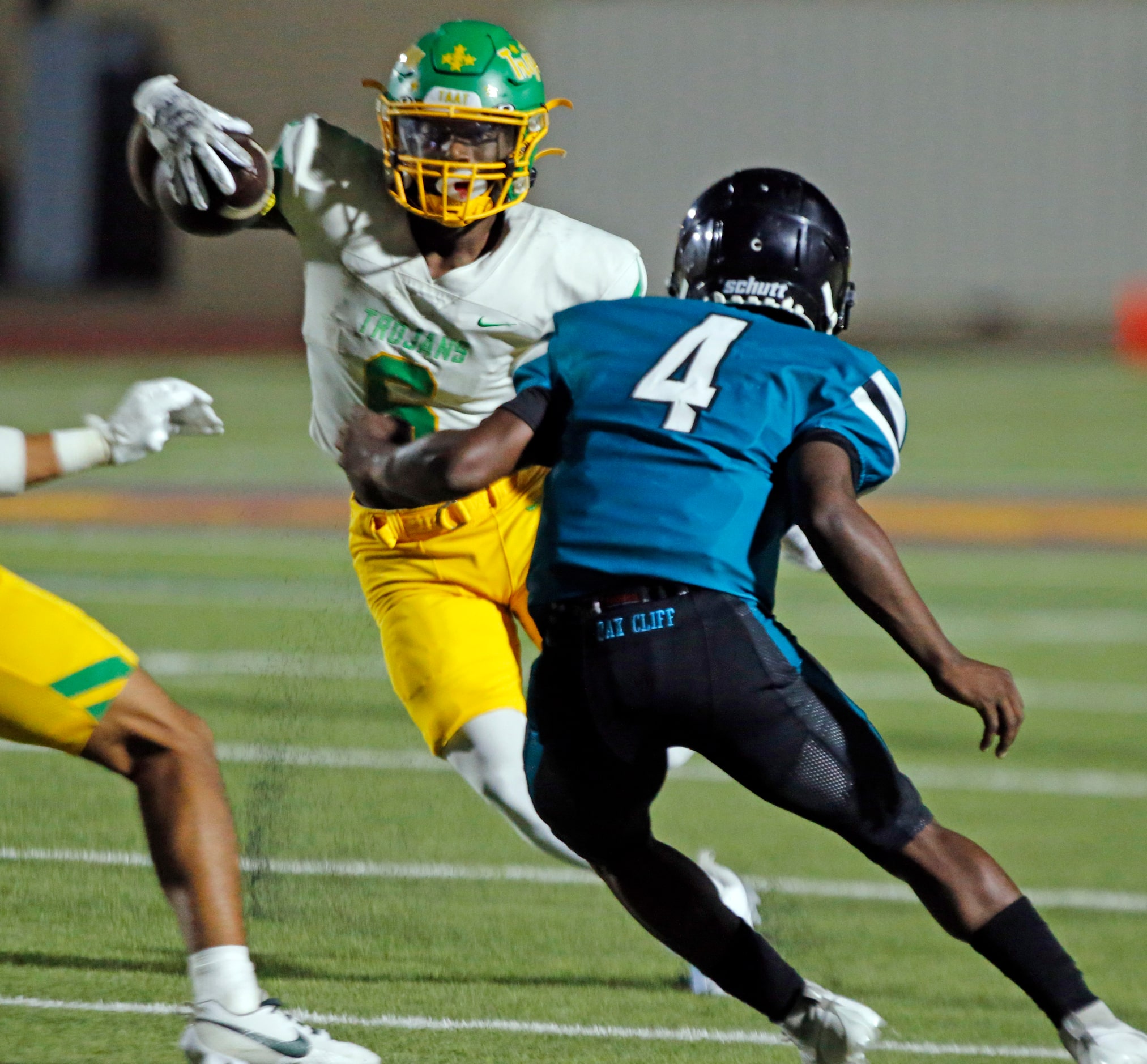 Carrollton Newman Smith high RB Allijah Harrison (6) cuts thru the Molina high defense...