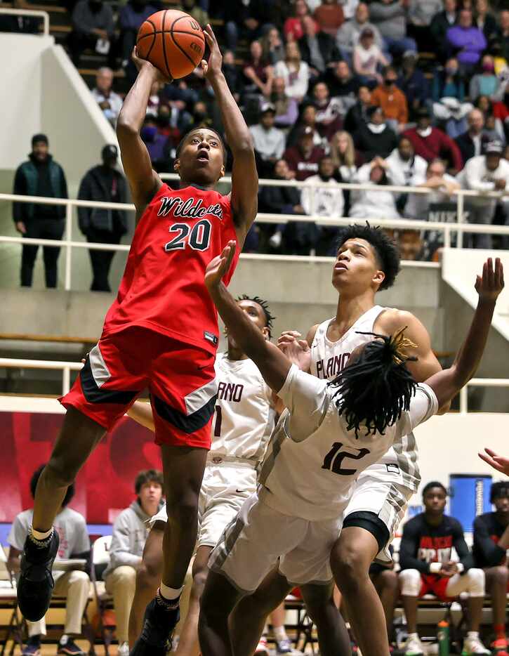 Lake Highland guard Tre Johnson scores 26 points in a victory over Plano, 58-56 in the 6A...