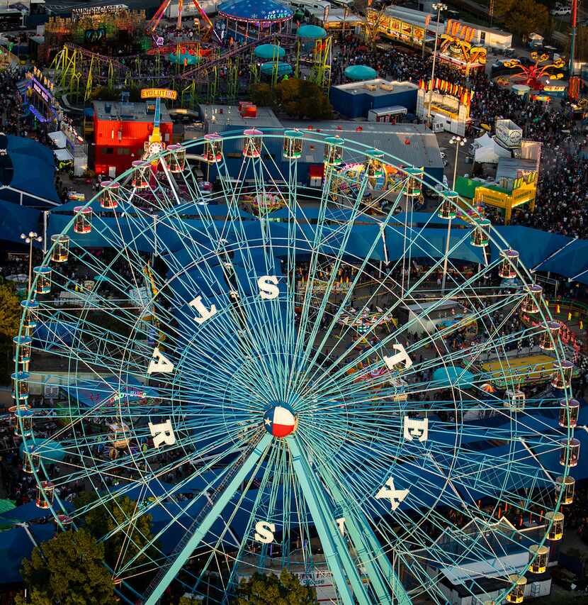 Crowds fill the midway at the State Fair of Texas in Fair Park on Saturday, Oct. 20, 2018,...