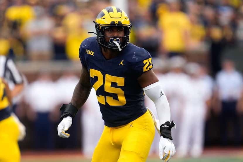 Michigan linebacker Junior Colson plays against UNLV in the second half of an NCAA college...