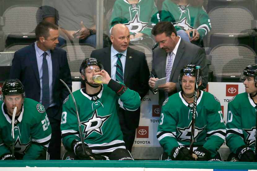 Dallas Stars head coach Jim Montgomery directs his team during the second period of a...