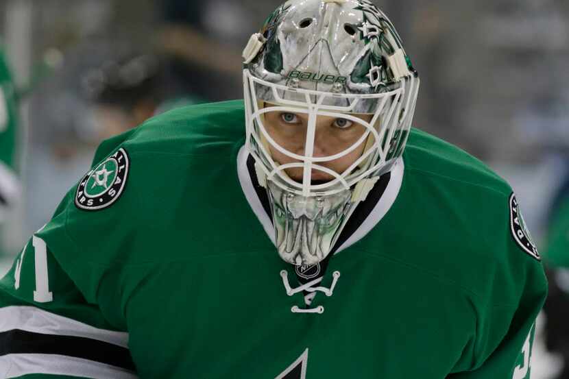 Dallas Stars goalie Antti Niemi (31) warms up before an NHL hockey game against the Edmonton...