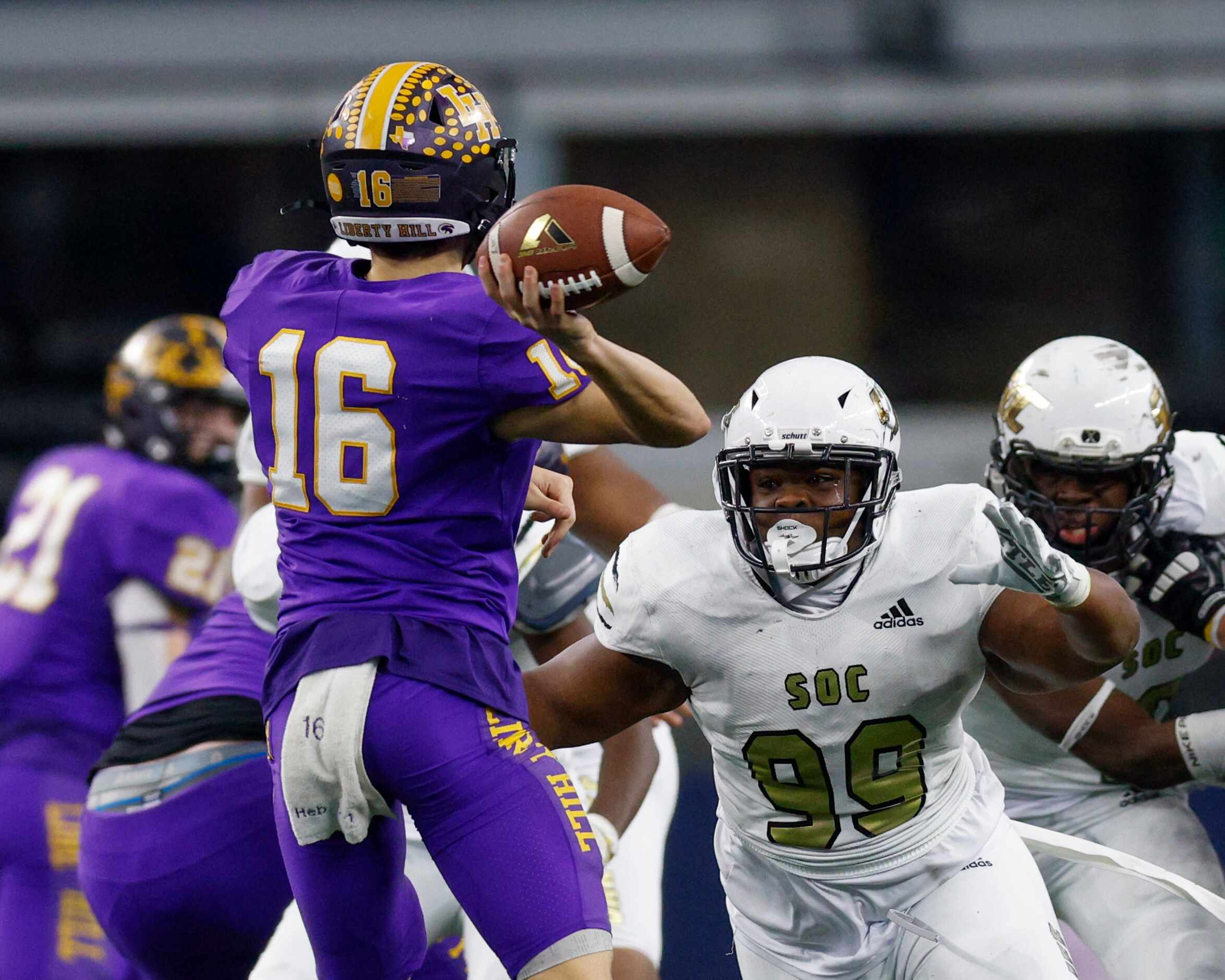 South Oak Cliff defensive lineman Courtland Kidd (99) pressures Liberty Hill quarterback...