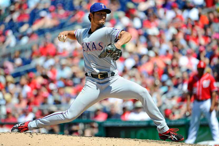 Jun 1, 2014; Washington, DC, USA; Texas Rangers starting pitcher Yu Darvish (11) throws...