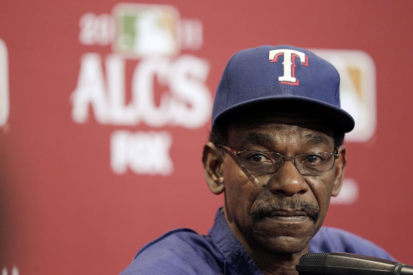 Texas Rangers manager Ron Washington listens to a question during a news conference on...