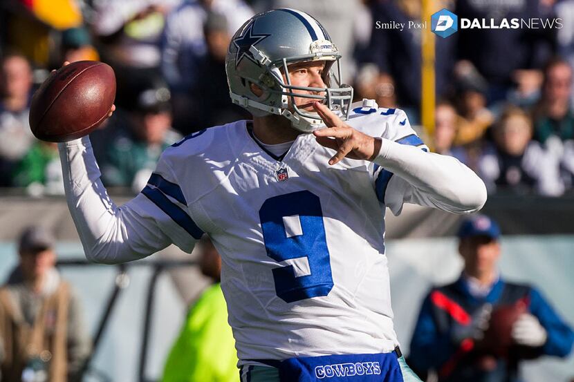 Dallas Cowboys quarterback Tony Romo (9) throws a pass during the first half of an NFL...