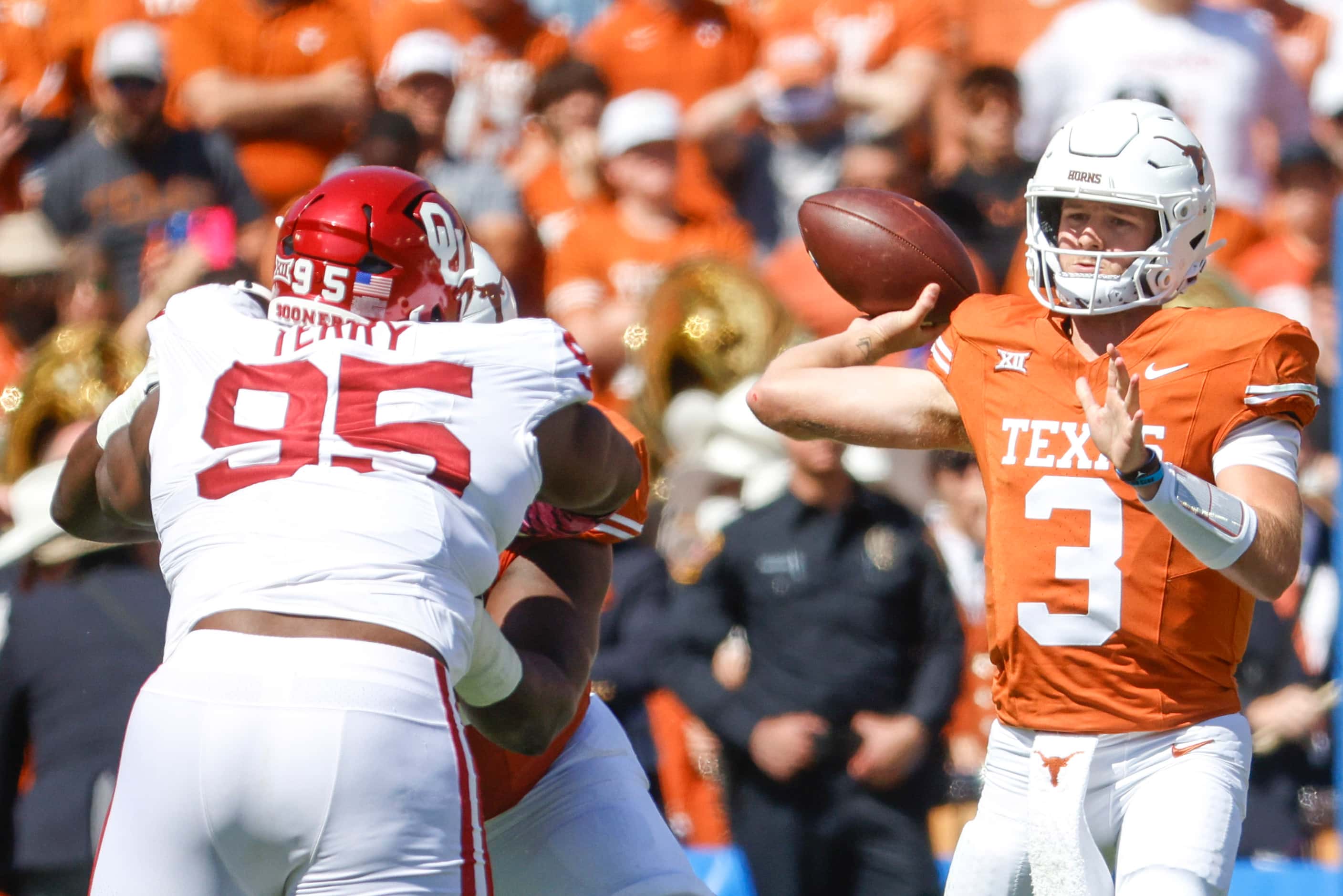 Texas quarterback Quinn Ewers throws during the second half of Red River Rivalry at the...