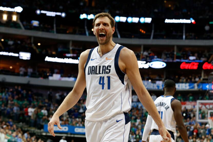 Dallas Mavericks forward Dirk Nowitzki argues a foul call during the second half of the...