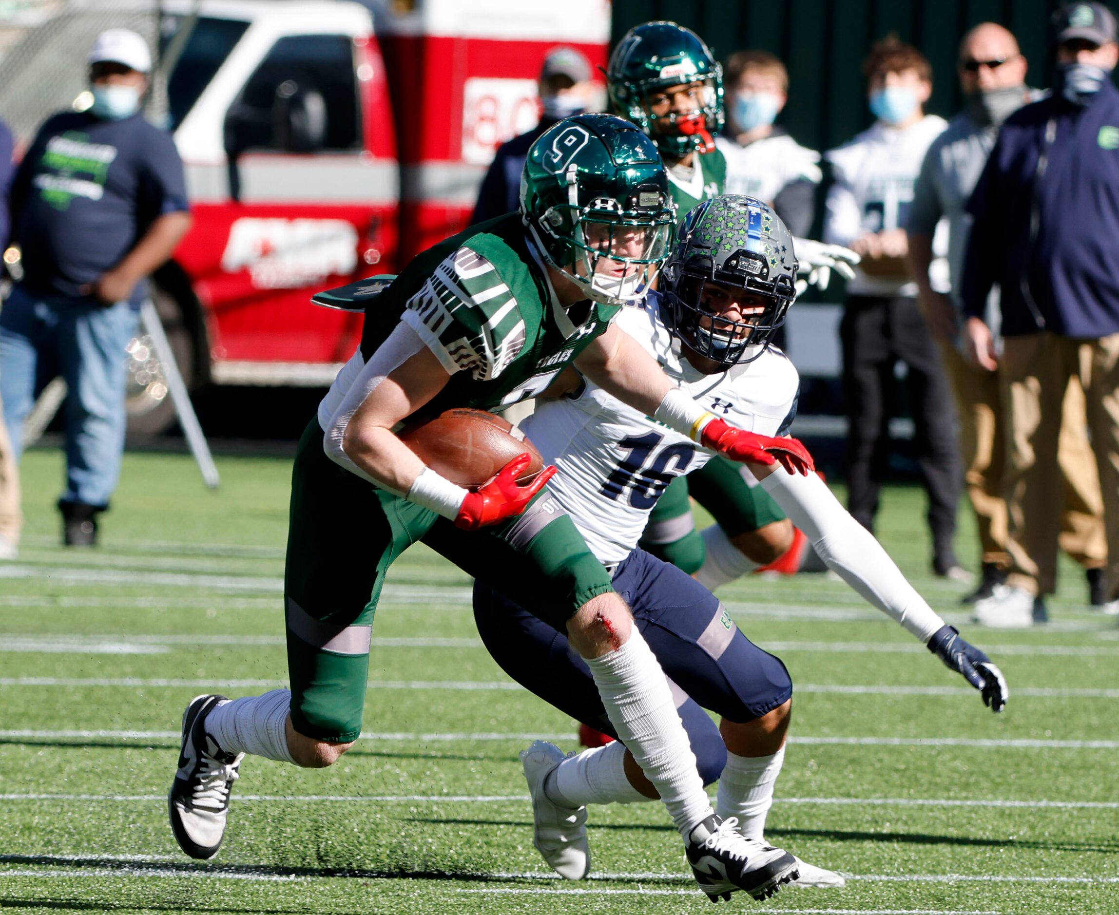 Prosper’s Cameron Harpole (9) makes a reception in front of Northwest Eaton’s Preston...