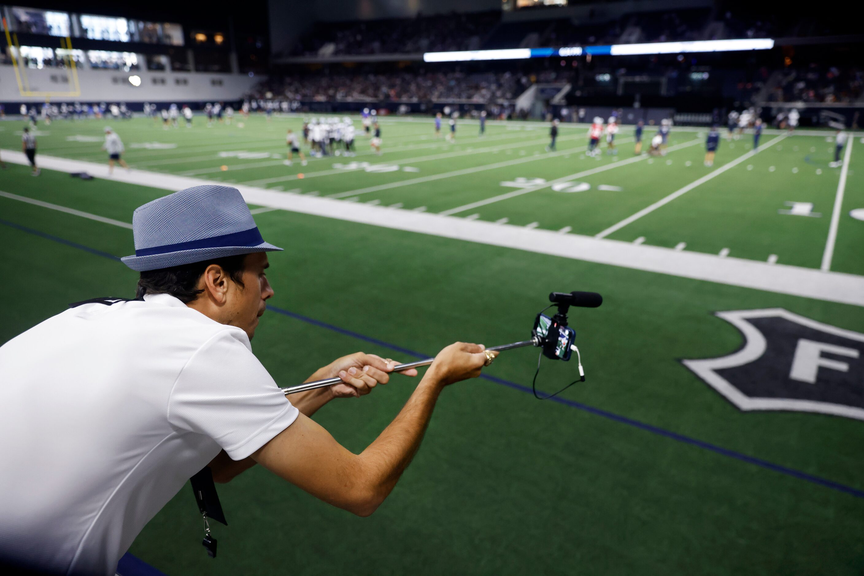 Donning a fedora similar to former coach Tom Laundry, Keith Hudacko of College Station...