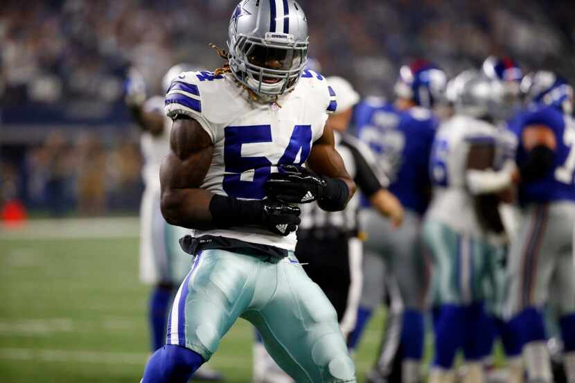 Dallas Cowboys linebacker Jaylon Smith (54) celebrates a defensive stop against the New York...