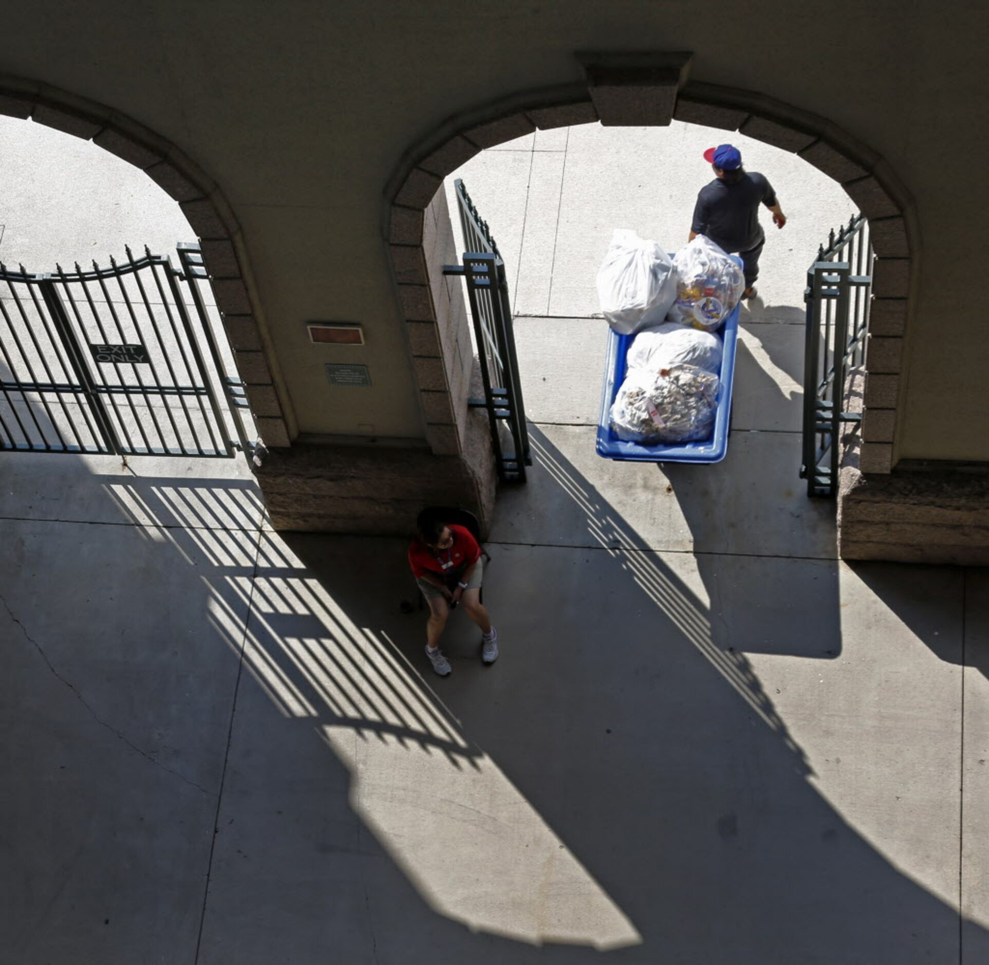 Trash is taken out of Globe Life Park during the Oakland Athletics vs. the Texas Rangers...