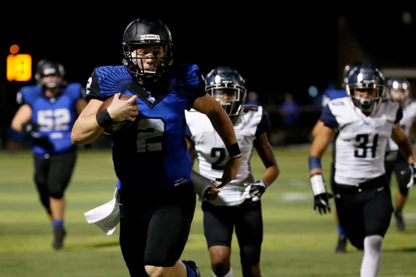 North Forney quarterback Colby Suits (2) runs the ball for a touchdown against Wylie East in...