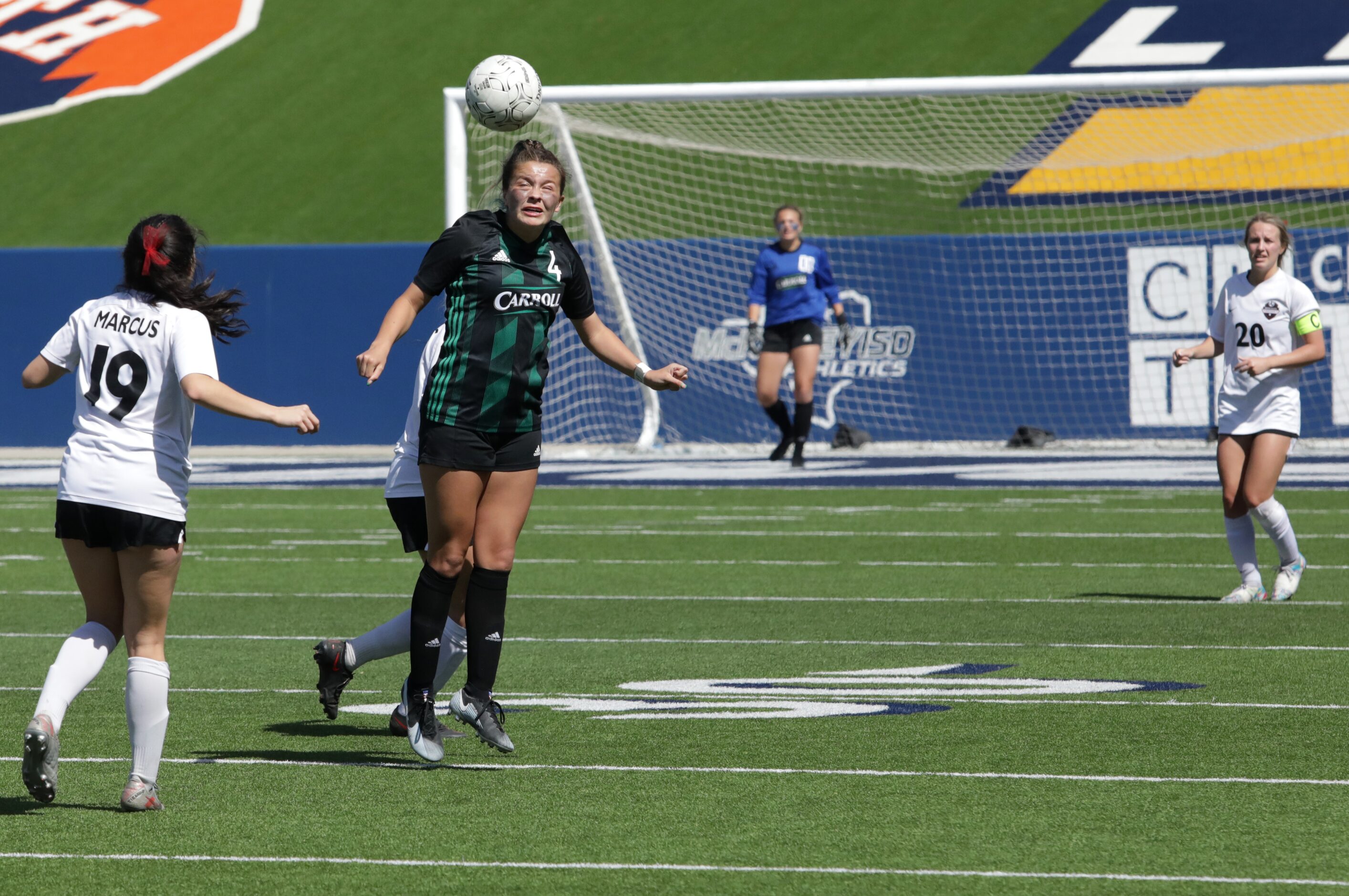 Southlake Carroll player #4, Kenzi Tufts, hits the ball during a Class 6A Region I...