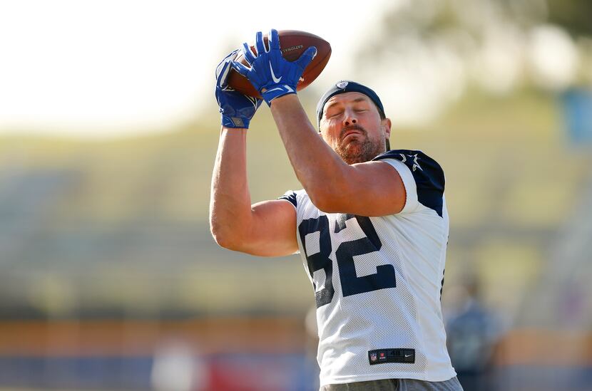 Dallas Cowboys tight end Jason Witten (82) catches a pass with his eyes shut during an...