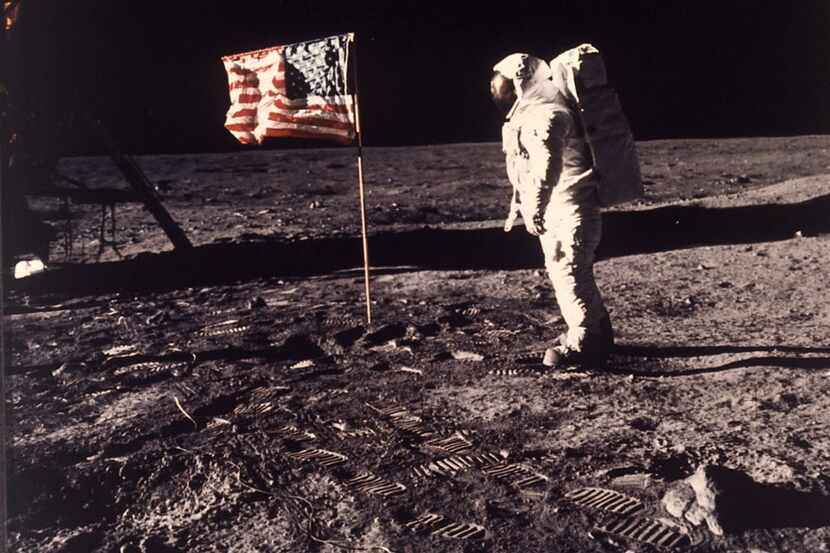  In this July 20, 1969 file photo, astronaut Edwin E. "Buzz" Aldrin Jr. stands next to a...