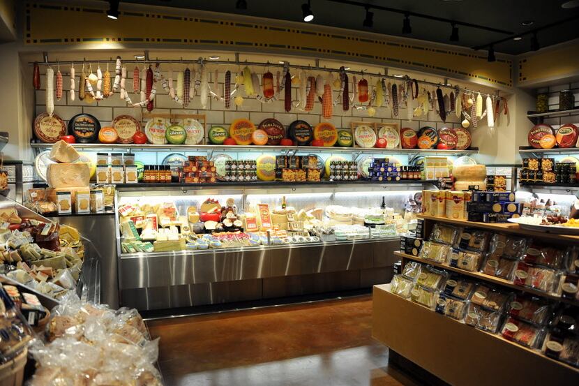 Pre-packaged varieties of cheese and crackers allow customers at Eatzi's to pick their...