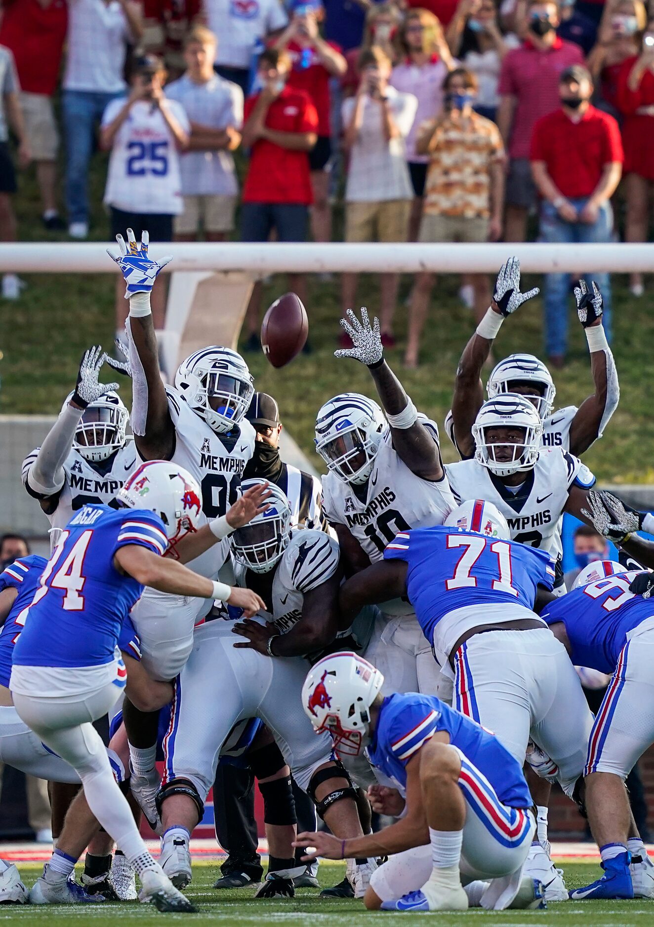 SMU place kicker Chris Naggar (34) hits a 43-yard game-winning field goal in the final...