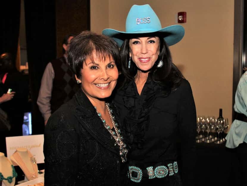 Former WFAA-TV (Channel 8) news anchor Gloria Campos (left) shared a moment with White at a...