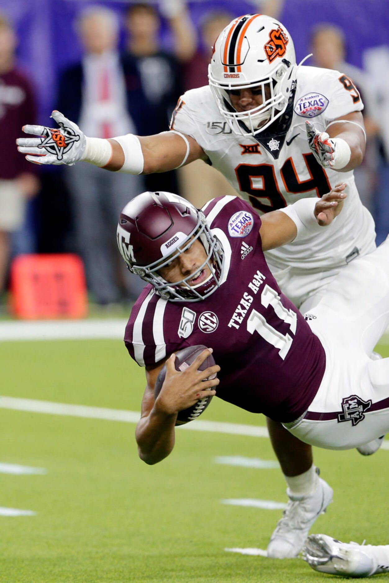 Texas A&M quarterback Kellen Mond (11) dives just short of the end zone in front of Oklahoma...