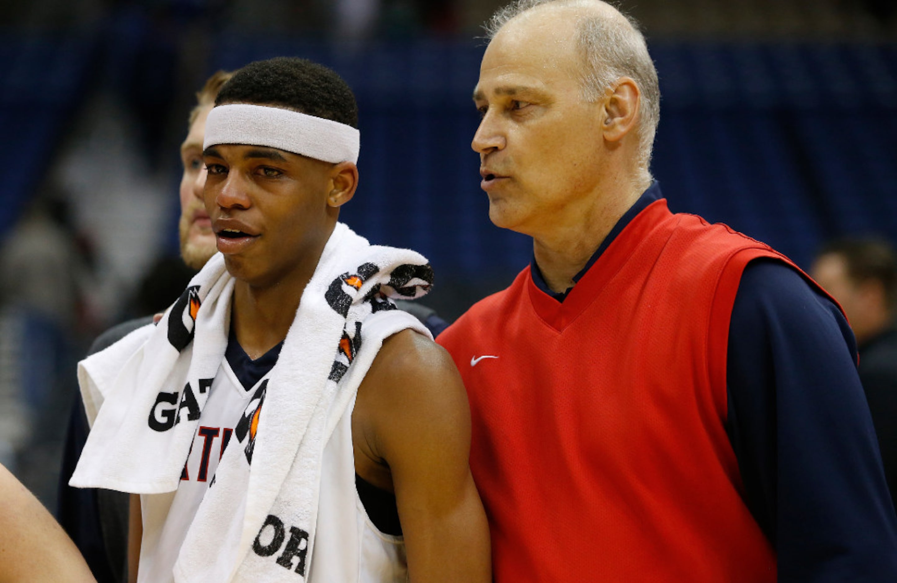 Justin Northwest head coach Mike Hatch, right, speaks with Avery Anderson (3) after falling...