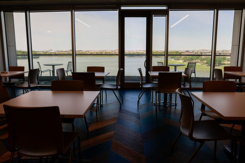 Floor-to-ceiling windows at the PNC Tech Hub offices offer a view of the Elm Fork of the...