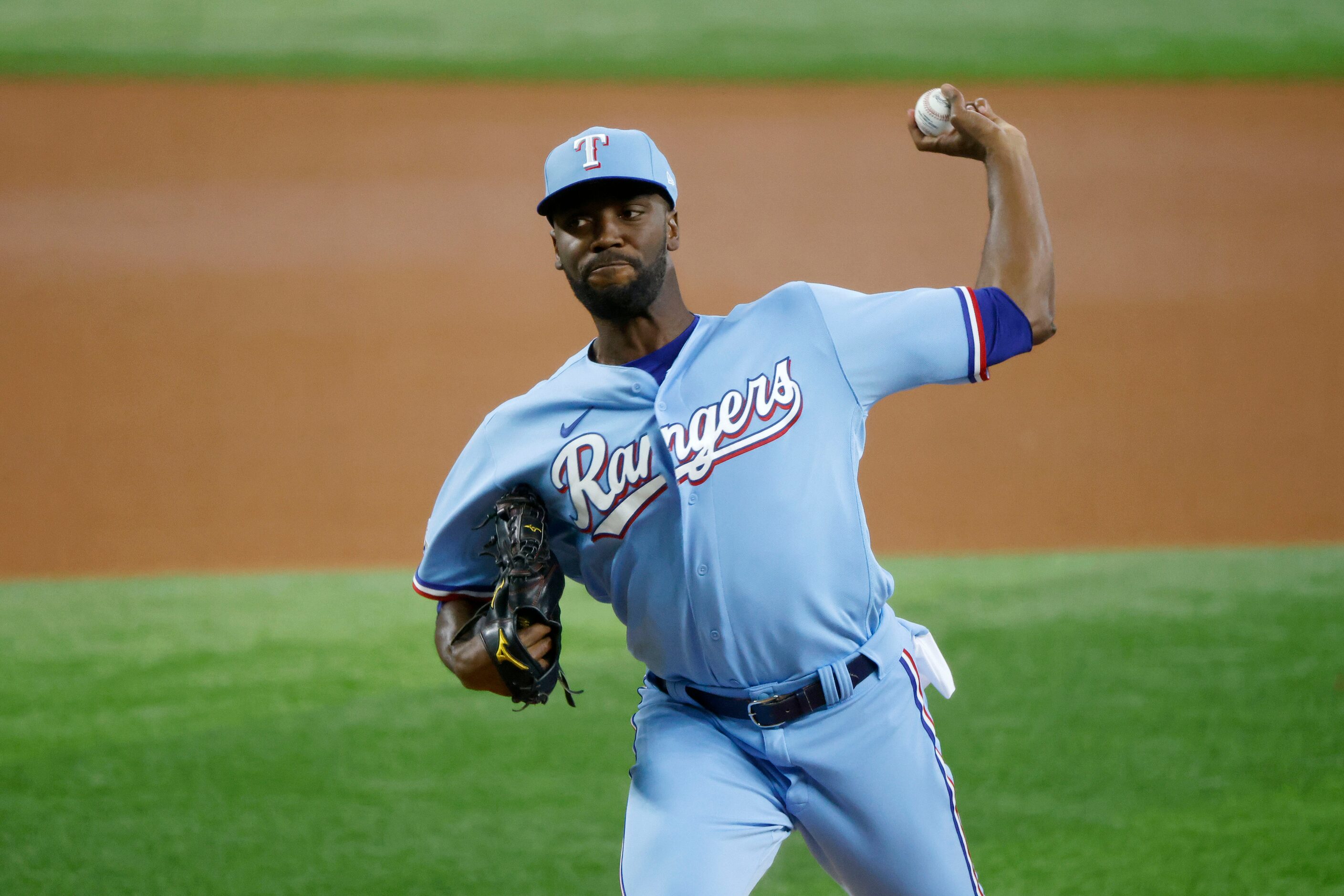 Texas Rangers starting pitcher Taylor Hearn (52) pitches against the Atlanta Braves during...