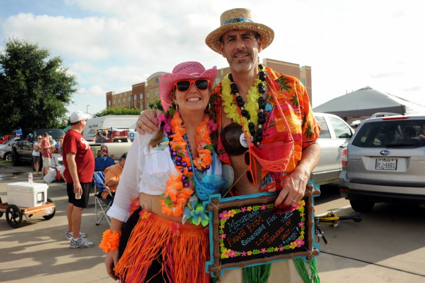 Fans from Michigan party at the Jimmy Buffett tailgate at Toyota Stadium in Frisco, TX on...